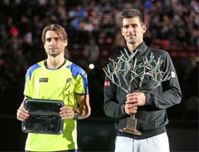 Djokovic đánh bại David Ferrer để giành danh hiệu Paris Masters. (ảnh: AP)