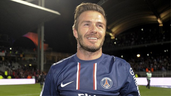 Beckham khoác áo PSG và cùng đội bóng này vô địch Ligue I (Ảnh: Getty Images),