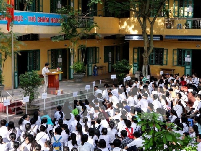 Thí sinh nghe phổ biến quy chế thi tốt nghiệp trung học phổ thông năm 2014. (Ảnh: Quý Trung/TTXVN)