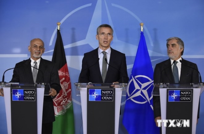 Tổng Thư ký NATO Jens Stoltenberg (giữa). (Nguồn: AFP/TTXVN)