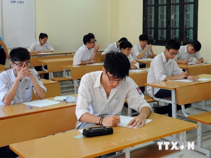 Thí sinh dự thi tốt nghiệp trung học phổ thông năm 2014. (Ảnh: Quý Trung/TTXVN)