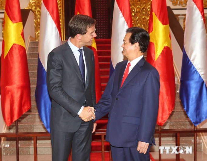 Thủ tướng Nguyễn Tấn Dũng đón tiếp Thủ tướng Vương quốc Hà Lan Mark Rutte. (Ảnh: TTXVN)