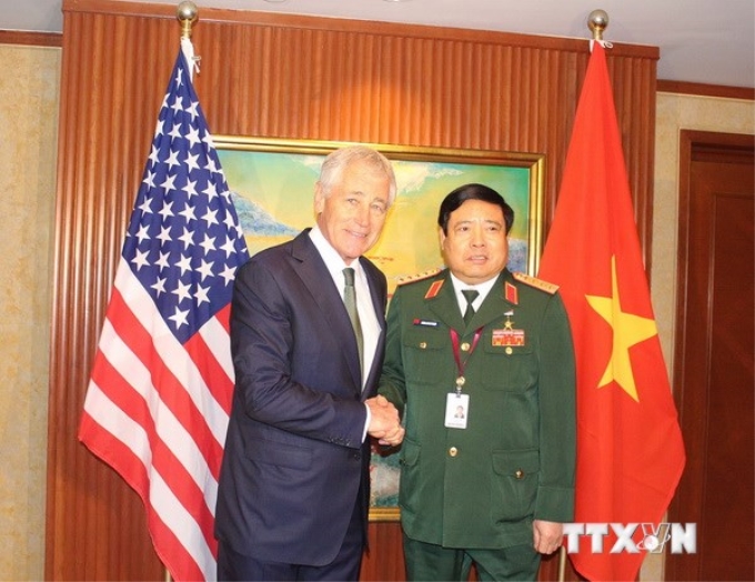 Bộ trưởng Quốc phòng Phùng Quang Thanh và người đồng cấp Mỹ Chuck Hagel. (Nguồn: TTXVN)