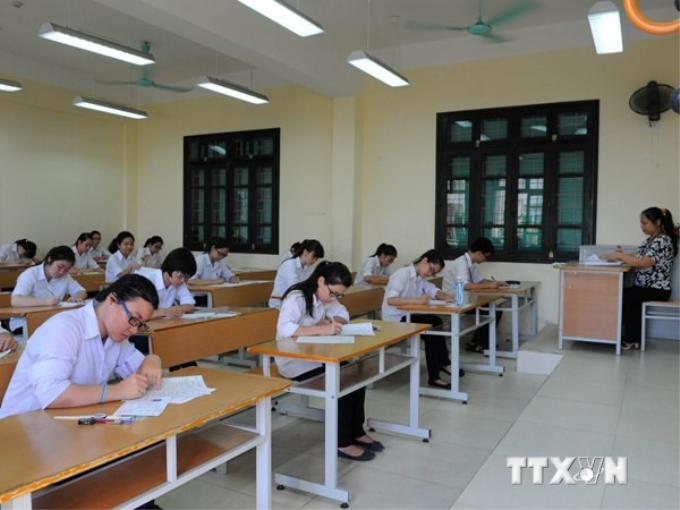 Thí sinh dự thi tốt nghiệp trung học phổ thông năm 2014. (Ảnh: Quý Trung/TTXVN)