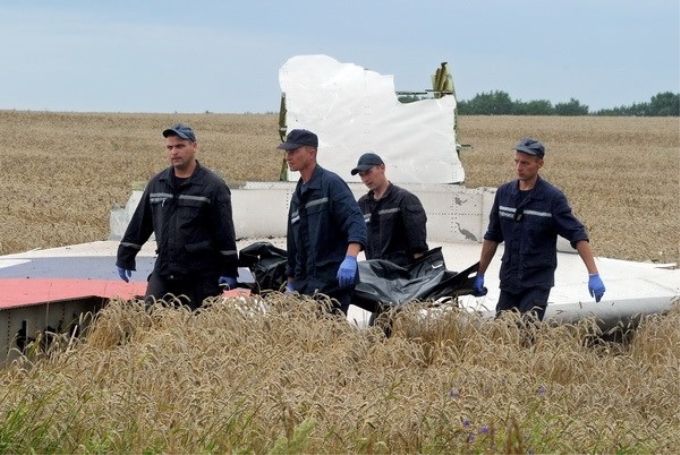 Lực lượng cứu hộ Ukraine tìm kiếm thi thể các nạn nhân, tại Grabove, Donetsk ngày 19/7. (Nguồn: AFP/ TTXVN)