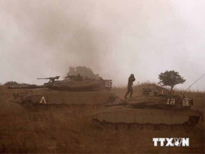 Binh sỹ và quân sự Israel tham gia cuộc tập trận ngày 18/7/2013 tại cao nguyên Golan. (Nguồn: AFP/TTXVN)