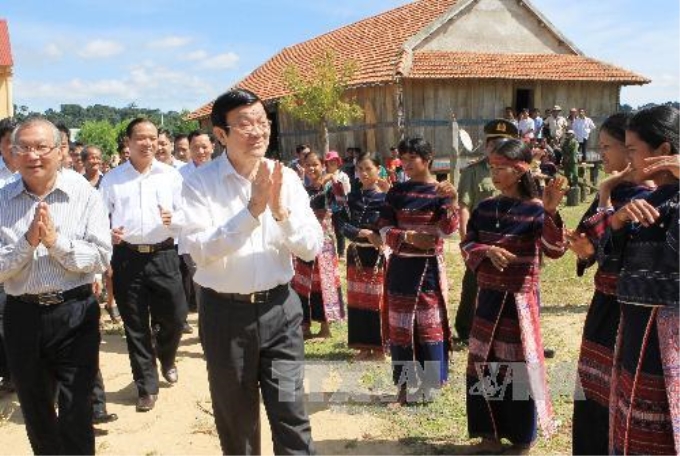 Chủ tịch nước Trương Tấn Sang thăm Khu tái định cư Thủy điện An Khê - Kanak, huyện K'Bang. Ảnh: Nguyễn Khang – TTXVN