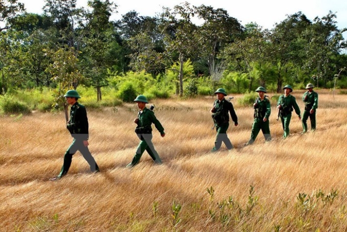 Tuần tra khu vực vành đai biên giới Việt Nam-Campuchia. (Ảnh minh họa: Dương Giang/TTXVN)