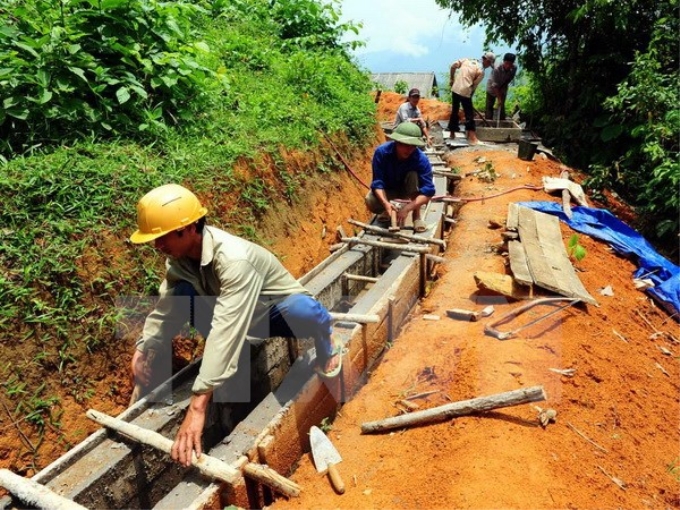 Xây dựng công trình trong Chương trình 135 ở huyện Bát Xát, Lào cai. (Ảnh: Thanh Hà/TTXVN)