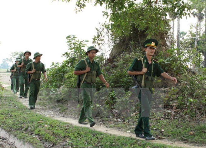 Cán bộ, chiến sỹ Đồn biên phòng 839 Tây Ninh tuần tra bảo vệ vùng biên. (Ảnh: Phương Vy/TTXVN)