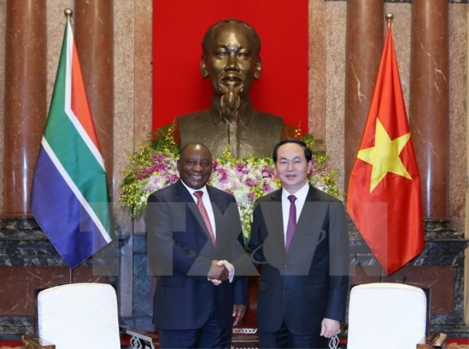 Chủ tịch nước Trần Đại Quang tiếp Phó Tổng thống Nam Phi Cyril Ramaphosa. (Ảnh: TTXVN)