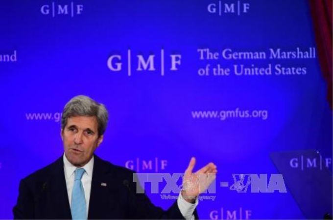 Ngoại trưởng Mỹ John Kerry phát biểu tại Brussels, Bỉ ngày 4/10. Ảnh: AFP/TTXVN