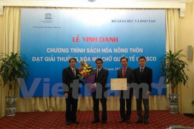 Lễ vinh danh chương trình "Sách hóa nông thôn Việt Nam" diễn ra sáng 16/12 tại Hà Nội. (Ảnh: PV/Vietnam+)