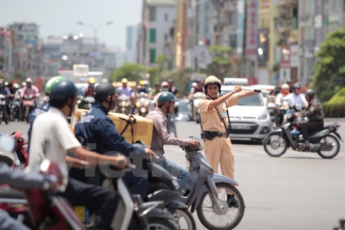 Cảnh sát giao thông Hà Nội nỗ lực đảm bảo an toàn cho Kỳ thi Trung học Phổ thông Quốc Gia (Ảnh minh họa. Nguồn: Vietnam+)