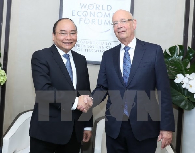 Thủ tướng Nguyễn Xuân Phúc gặp Chủ tịch Diễn đàn Kinh tế Thế giới (WEF) Klaus Schwab. (Ảnh: TTXVN)