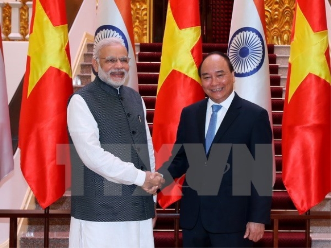 Thủ tướng Nguyễn Xuân Phúc đón tiếp Thủ tướng Ấn Độ Narendra Modi tháng 9/2016. (Ảnh: TTXVN)