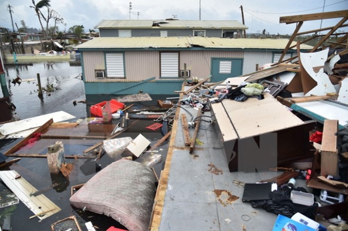 Cảnh hư hại sau bão Maria ở Catano, Puerto Rico ngày 21/9. (Nguồn: AFP/TTXVN)