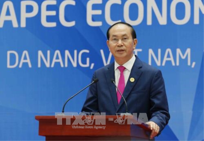 Chủ tịch nước Trần Đại Quang, Chủ tịch Hội nghị các nhà lãnh đạo kinh tế APEC lần thứ 25, phát biểu tại buổi họp báo. Ảnh: TTXVN