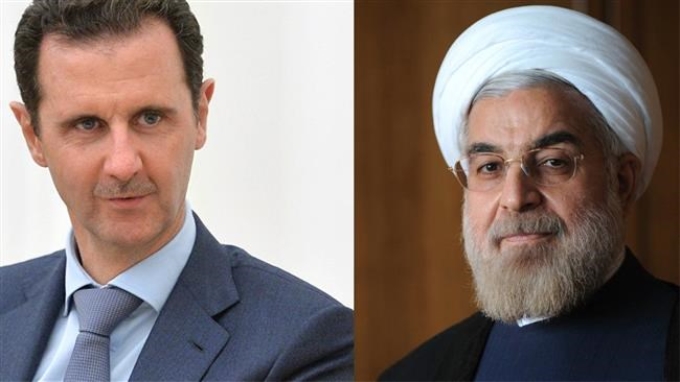 Tổng thống Syria Bashar al-Assad (trái) và người đồng cấp Iran Hassan Rouhani. (Nguồn: presstv.com)