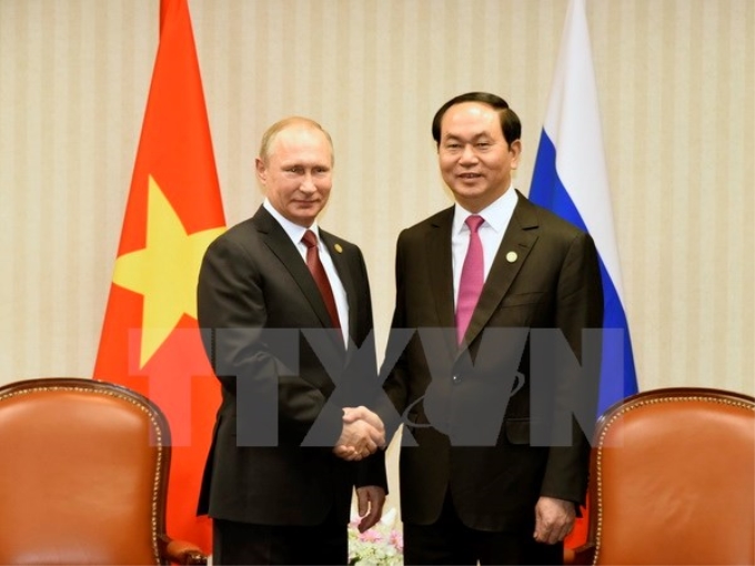 Chủ tịch nước Trần Đại Quang gặp Tổng thống Liên bang Nga Putin trong khuôn khổ Tuần lễ Cấp cao APEC lần thứ 24 tại Peru. (Nguồn: TTXVN)