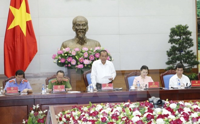 Phó Thủ tướng Thường trực Chính phủ Trương Hòa Bình chủ trì Hội nghị sơ kết công tác phòng, chống tội phạm; phòng, chống mua bán người 6 tháng đầu năm 2017. (Ảnh: Doãn Tấn/TTXVN)