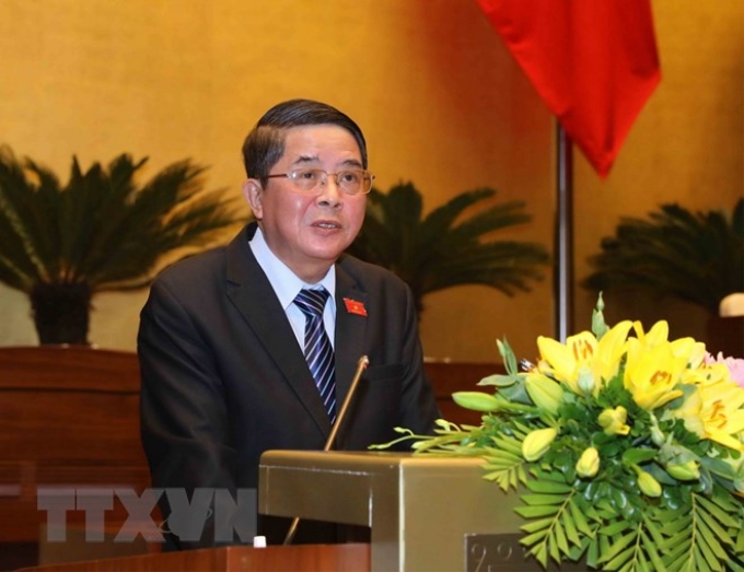 Chủ nhiệm Ủy ban Tài chính, Ngân sách của Quốc hội Nguyễn Đức Hải trình bày các báo cáo thẩm tra về ngân sách nhà nước. (Ảnh: TTXVN)