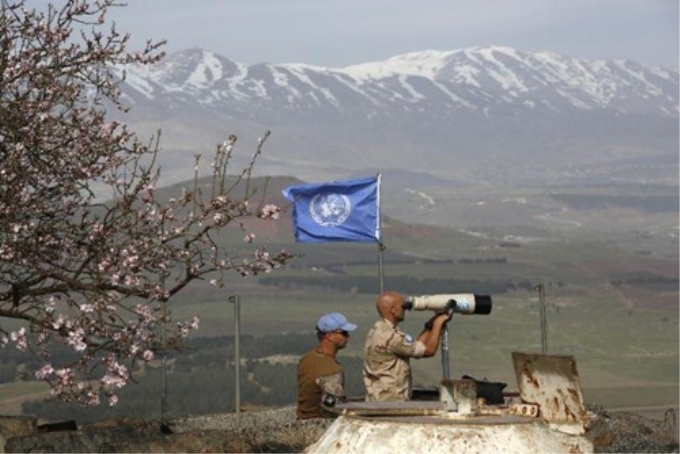 Lực lượng gìn giữ hòa bình LHQ giám sát tại khu vực cao nguyên Golan ở biên giới Israel-Syria. (Ảnh: AFP)