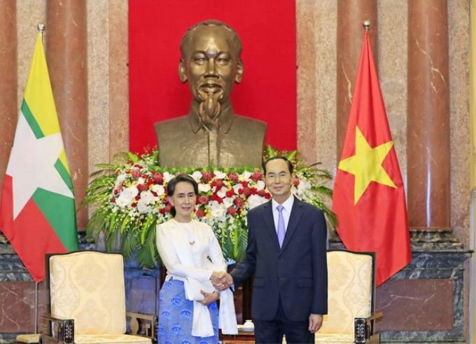 Chủ tịch nước Trần Đại Quang tiếp Cố vấn Nhà nước Myanmar Aung San Suu Kyi. (Ảnh: Nhan Sáng/TTXVN)