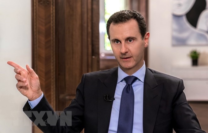 Ảnh tư liệu: Tổng thống Syria Bashar al-Assad trả lời phỏng vấn truyền thông Nga tại Damascus ngày 24/6. (Nguồn: AFP/TTXVN)