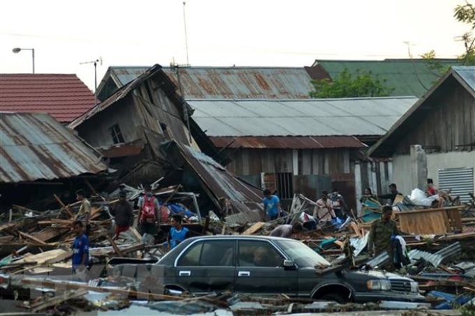 Cảnh đổ nát do động đất, sóng thần tàn phá ở Palu, đảo Sulawesi. (Nguồn: AFP/TTXVN)