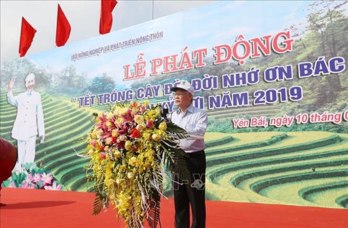 Tổng Bí thư, Chủ tịch nước Nguyễn Phú Trọng phát động “Tết trồng cây đời đời nhớ ơn Bác Hồ” tại xã Việt Cường, huyện Trấn Yên. Ảnh: Trí Dũng/TTXVN