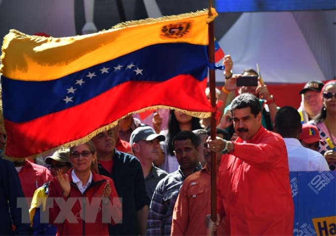 Tổng thống Venezuela Nicolas Maduro tham gia cuộc tuần hành ủng hộ Chính phủ ở Caracas ngày 23/2/2019. (Nguồn: THX/TTXVN)