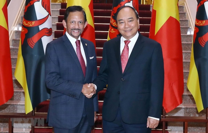 Thủ tướng Nguyễn Xuân Phúc đón, hội kiến với Quốc vương Brunei Darussalam Sultan Haji Hassanal Bolkiah. (Ảnh: TTXVN)