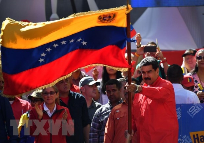 Tổng thống Venezuela Nicolas Maduro tham gia cuộc tuần hành ủng hộ Chính phủ ở Caracas ngày 23/2/2019. (Ảnh: THX/TTXVN)