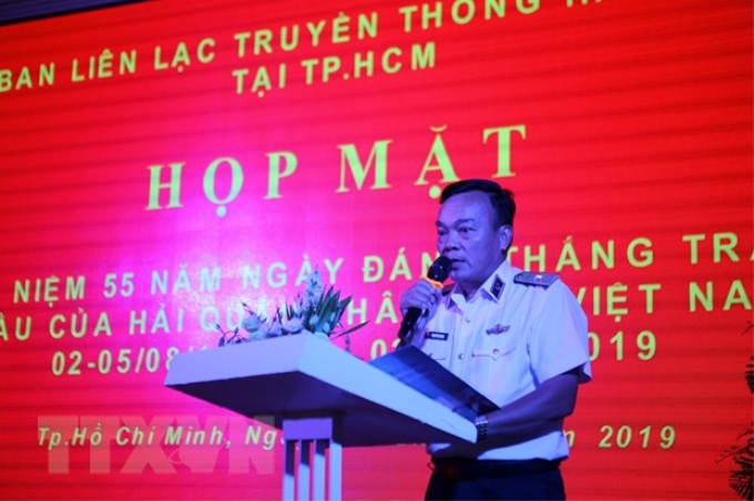 Chuẩn Đô đốc Phạm Văn Quang, Phó Chủ nhiệm Chính trị Hải quân, Bộ Tư lệnh Quân chủng Hải quân, phát biểu tại buổi họp mặt. (Ảnh: Thành Chung/TTXVN)