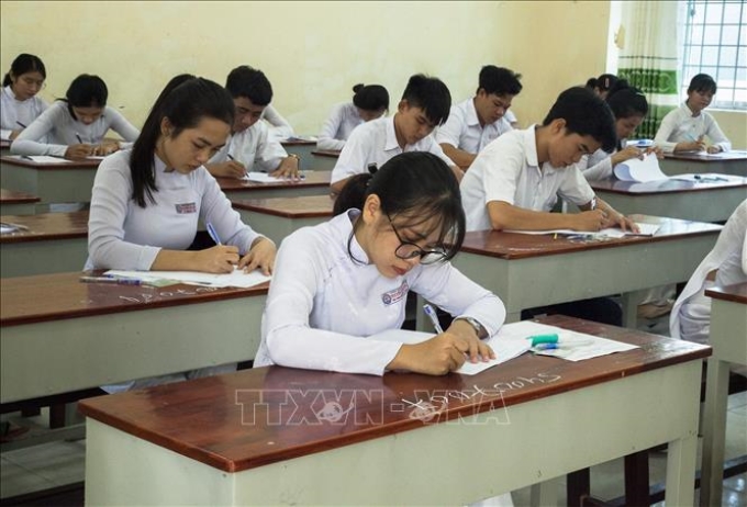 Các thí sinh tham gia Kỳ thi Trung học phổ thông Quốc gia năm 2019 tỉnh Kiên Giang. Ảnh tư liệu: Hồng Đạt/TTXVN