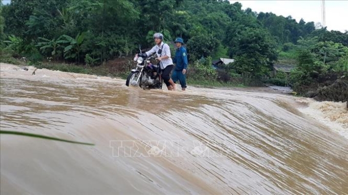 Ngày 4/7/2020, nhiều địa phương tại Lào Cai có mưa to gây ngập úng và lũ cục bộ. Ảnh: Hồng Ninh/TTXVN