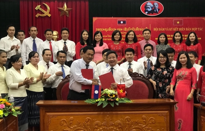 Lễ ký kết biên bản hợp tác giữa Ban Tuyên giáo Tỉnh ủy Quảng Bình và Ban Tuyên huấn tỉnh Khăm Muộn, CHDCND Lào, năm 2019. (Ảnh minh họa).