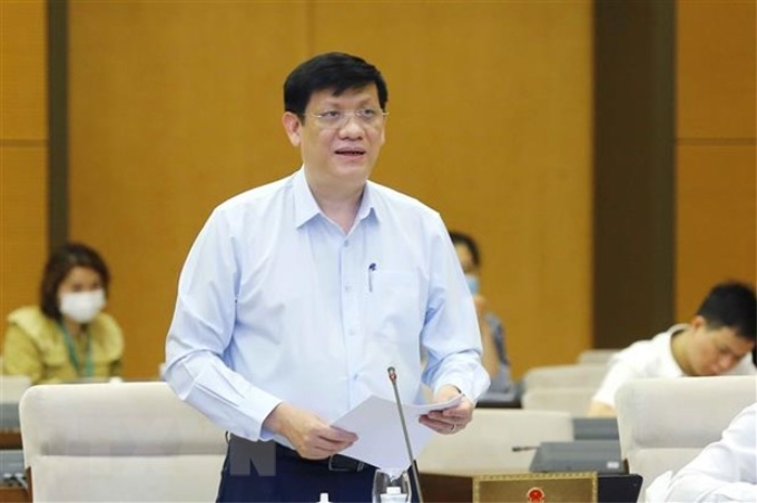 Bộ trưởng Bộ Y tế Nguyễn Thanh Long trình bày các báo cáo. (Ảnh: Doãn Tấn/TTXVN)