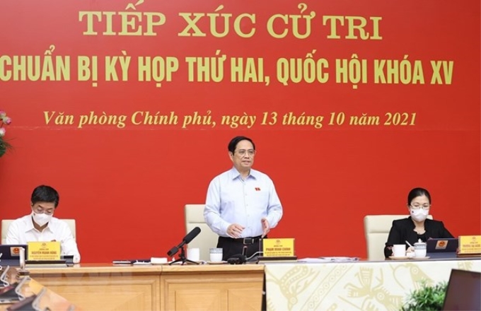 Thủ tướng phát biểu tại buổi tiếp xúc cử tri thành phố Cần Thơ theo hình thức trực tuyến. (Ảnh: TTXVN)