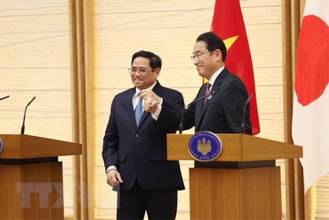 Thủ tướng Phạm Minh Chính và Thủ tướng Nhật Bản Kishida Fumio tại cuộc gặp gỡ báo chí. (Ảnh: Dương Giang/TTXVN)