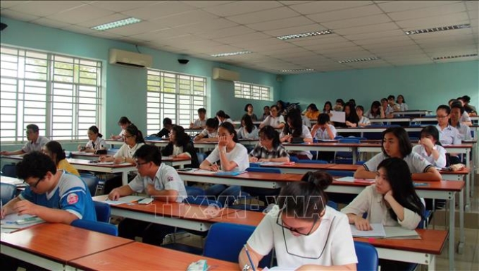 Thí sinh chuẩn bị thi đánh giá năng lực tại điểm thi Đại học Bách khoa, Đại học học Quốc gia TP Hồ Chí Minh (Quận 10). Ảnh tư liệu: Thu Hoài/TTXVN