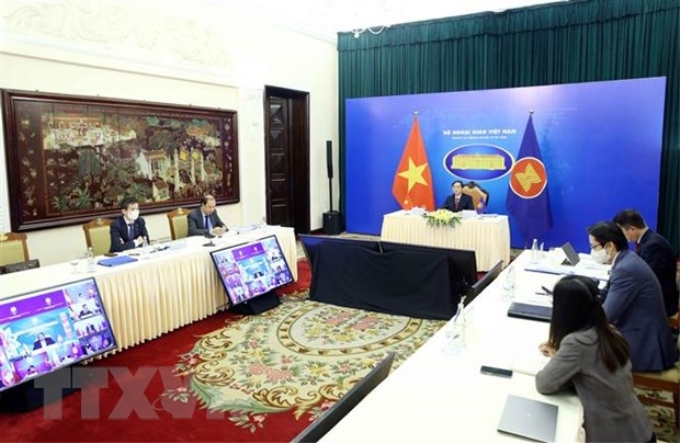 Bộ trưởng Bộ Ngoại giao Bùi Thanh Sơn tham dự Hội nghị Ủy ban khu vực Đông Nam Á không có vũ khí hạt nhân (SEANWFZ) theo hình thức trực tuyến. (Ảnh: TTXVN)