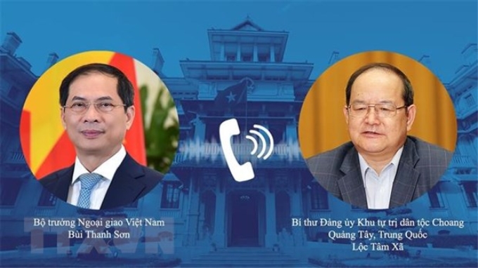 Bộ trưởng Ngoại giao Bùi Thanh Sơn điện đàm với Bí thư Đảng ủy Khu Tự trị dân tộc Choang Quảng Tây. (Ảnh: TTXVN phát)