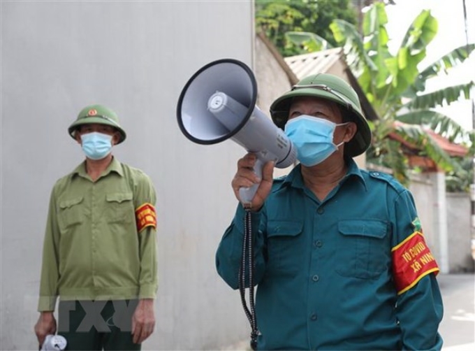 Tổ phòng, chống COVID cộng đồng thôn Phúc Ninh, xã Ninh Sơn, huyện Việt Yên, tỉnh Bắc Giang. (Ảnh: Danh Lam/TTXVN)