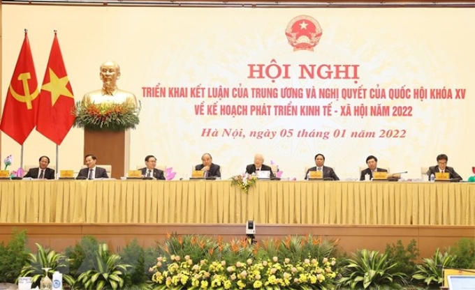 Tổng Bí thư Nguyễn Phú Trọng cùng các đồng chí lãnh đạo Đảng, Nhà nước chủ trì Hội nghị Chính phủ với các địa phương triển khai kết luận của Trung ương và Nghị quyết của Quốc hội về kế hoạch phát triển kinh tế - xã hội năm 2022. (Ảnh: TTXVN)