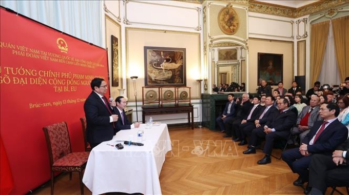 Thủ tướng Phạm Minh Chính phát biểu tại buổi gặp đại diện cộng đồng người Việt Nam tại Vương quốc Bỉ. Ảnh: Dương Giang/TTXVN