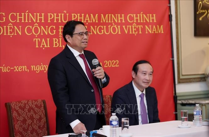 Thủ tướng Phạm Minh Chính phát biểu tại buổi gặp đại diện cộng đồng người Việt Nam tại Vương quốc Bỉ. Ảnh: Dương Giang/TTXVN