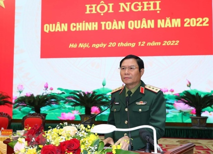 Thượng tướng Nguyễn Tân Cương, Tổng Tham mưu trưởng Quân đội Nhân dân Việt Nam, Thứ trưởng Bộ Quốc phòng đọc báo cáo tại hội nghị. (Ảnh: Trọng Đức/TTXVN)