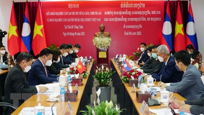 Quang cảnh cuộc hội đàm giữa lãnh đạo thành phố Hà Nội và Vientiane. (Ảnh: Đỗ Thành/TTXVN)